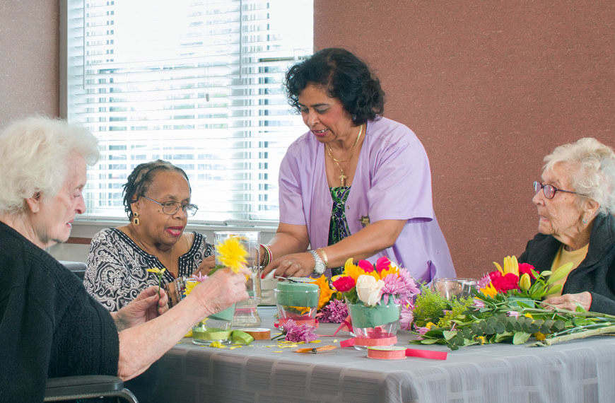 Lynbrook rehabilitation patients in flower arranging activity